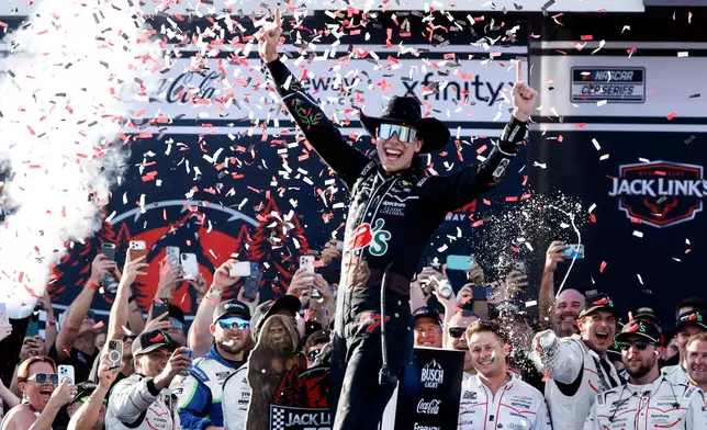 Carson Hocevar celebrates after winning a NASCAR Cup Series auto race, Sunday, April 26, 2026, in Talladega, Ala. (AP Photo/Butch Dill)