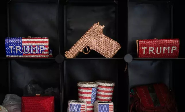 US flag symbol merchandise and other rhinestone-studded items are displayed at the California Republican Party Convention in San Diego, Saturday, April 11, 2026. (AP Photo/Jae C. Hong)