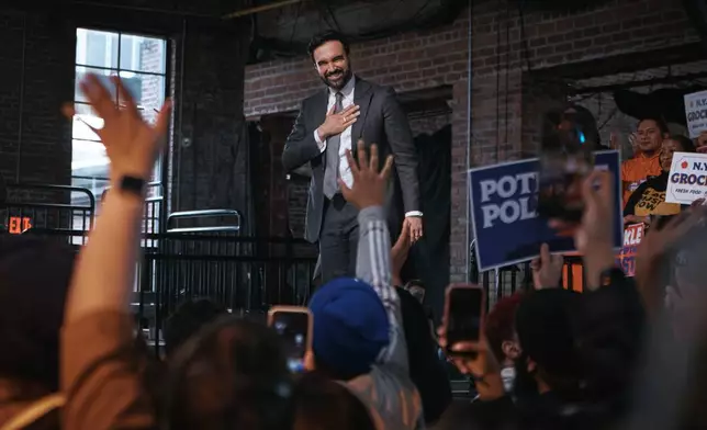 New York City Mayor Zohran Mamdani salutes his supporters during an address marking his first 100 days in office at the Knockdown Center, Sunday, April 12, 2026, in New York. (AP Photo/Andres Kudacki)