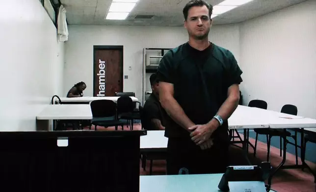 FILE - Hawaii doctor Gerhardt Konig appears before a judge via video during an arraignment hearing after being indicted on allegation of attempting to kill his wife, April 7, 2025, in Honolulu. (AP Photo/Marco Garcia, File)