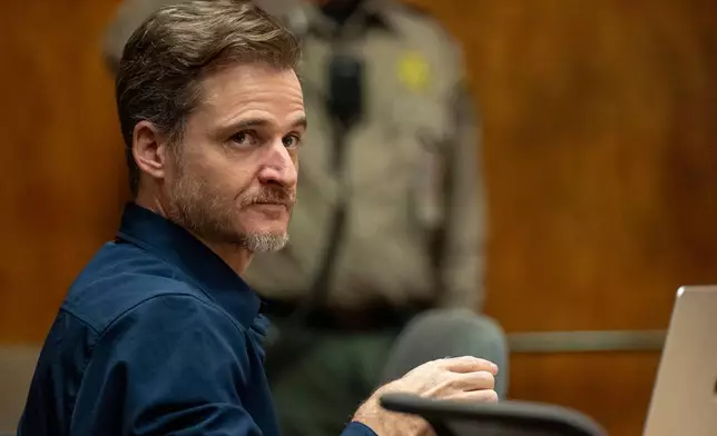 Gerhardt Konig appears in court before closing arguments in his attempted murder trial, Tuesday, April 7, 2026, in Honolulu. (AP Photo/Mengshin Lin, Pool)