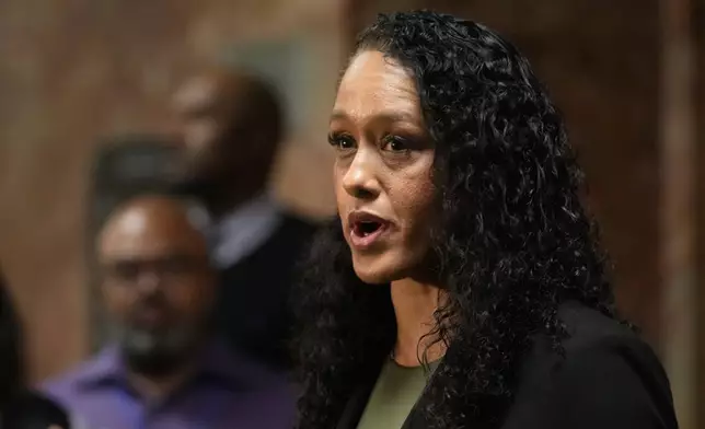 San Francisco District Attorney Brooke Jenkins speaks to reporters outside of a courtroom, Tuesday, April 14, 2026, in San Francisco. (AP Photo/Jeff Chiu)