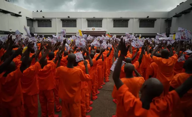 Inmates of the Bata Prison meet with Pope Leo XIV during his visit to Equatorial Guinea, Wednesday, April 22, 2026. (AP Photo/Andrew Medichini)