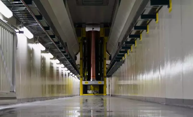 A trial copper casing is placed at Posiva's encapsulation plant on the island of Olkiluoto, Finland, Tuesday, Feb. 24, 2026. (AP Photo/James Brooks)