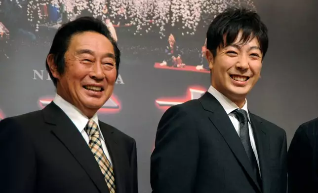 FILE -Japanese Kabuki actors, Kikugoro Onoe, left, and his son, Kikunosuke Onoe, attend a press conference in Tokyo Tuesday, Sept. 16, 2008. (AP Photo/Katsumi Kasahara)