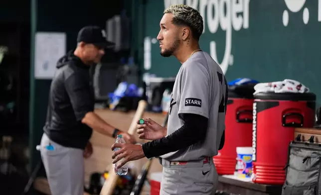 New York Yankees starting pitcher Elmer Rodriguez stands in the dugout after being pulled in the fifth inning of a baseball game against the Texas Rangers Wednesday, April 29, 2026, in Arlington, Texas. (AP Photo/Tony Gutierrez)