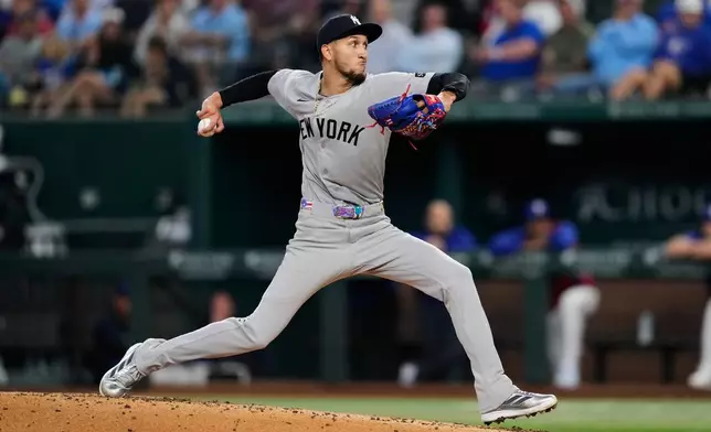 New York Yankees starting pitcher Elmer Rodriguez throws to the Texas Rangers in the second inning of a baseball game Wednesday, April 29, 2026, in Arlington, Texas. (AP Photo/Tony Gutierrez)