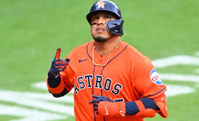 Houston Astros' Isaac Paredes celebrates after his solo home run in the fourth inning of a baseball game against the Cleveland Guardians in Cleveland, Monday, April 20, 2026. (AP Photo/David Richard)