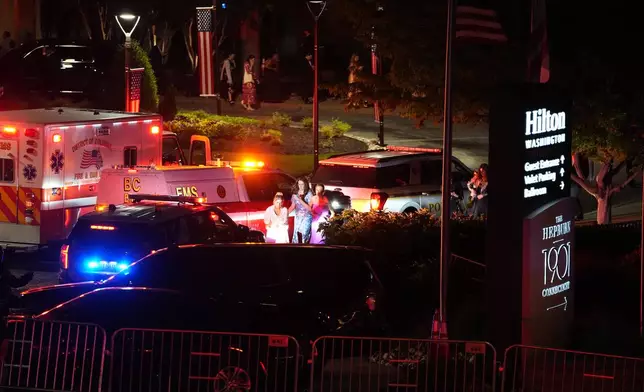 Law enforcement respond to an incident at the Washington Hilton during the White House Correspondents Dinner, Saturday, April 25, 2026, in Washington. (AP Photo/Allison Robbert)