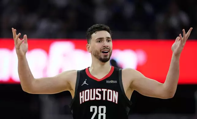 Houston Rockets center Alperen Sengun reacts during the first half of an NBA basketball game against the Golden State Warriors, Sunday, April 5, 2026, in San Francisco. (AP Photo/Godofredo A. Vásquez)