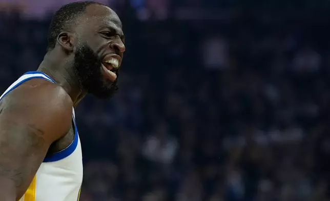 Golden State Warriors forward Draymond Green reacts after making a 3-point basket during the first half of an NBA basketball game against the Houston Rockets, Sunday, April 5, 2026, in San Francisco. (AP Photo/Godofredo A. Vásquez)