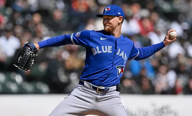 Toronto Blue Jays starter Eric Lauer delivers a pitch during the first inning of a baseball game against the Chicago White Sox in Chicago, Sunday, April 5, 2026. (AP Photo/Paul Beaty)