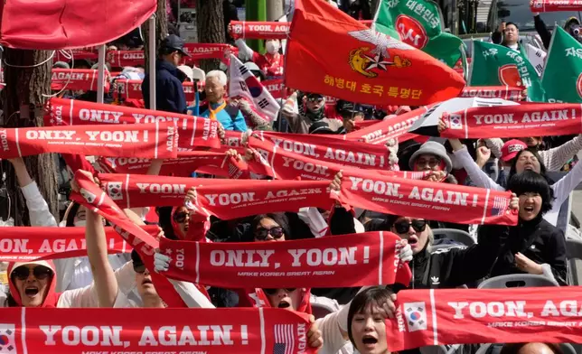 Supporters of former South Korean President Yoon Suk Yeol stage a rally outside of the Seoul High Court in Seoul, South Korea, Wednesday, April 29, 2026. (AP Photo/Ahn Young-joon)