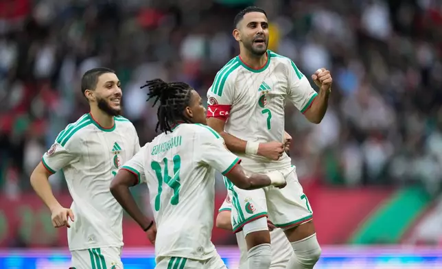 FILE - Algeria's Riyad Mahrez celebrates after scoring his side's second goal during the Africa Cup of Nations group E soccer match between Algeria and Sudan in Rabat, Morocco, Wednesday, Dec. 24, 2025. (AP Photo/Mosa'ab Elshamy, File)