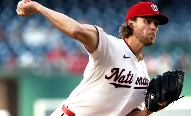 Washington Nationals pitcher Jake Irvin throws during the first inning of a baseball game against the Atlanta Braves, Monday, April 20, 2026, in Washington. (AP Photo/Daniel Kucin Jr.)