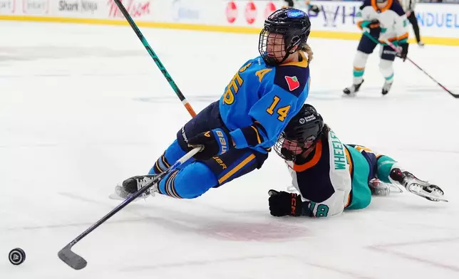 Toronto Sceptres' Renata Fast (14) is taken down by New York Sirens' Maddi Wheeler (18) during the first period of an PWHL hockey game in Toronto on Tuesday, April 21, 2026. (Frank Gunn/The Canadian Press via AP)