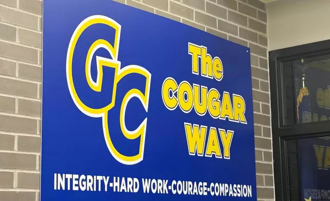 An inspirational hanging outside Greenfield Central High School, where UConn's Braylon Mullins attended, is shown, Monday, March 30, 2026, in Greenfield, Ind. (AP Photo/Mike Marot)