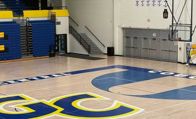 The McDonald's All-American and Indiana Mr. Basketball jersey of Braylon Mullins, who scored the game-winning basket for UConn in the Husky's Elite Eight win over Duke in the NCAA college basketball tournament, is displayed in Greenfield Central High School's gymnasium in Greenfield, Ind., Monday, March 30, 2026, following the Husky's Elite Eight win over Duke in the NCAA Tournament. (AP Photo/Mike Marot)