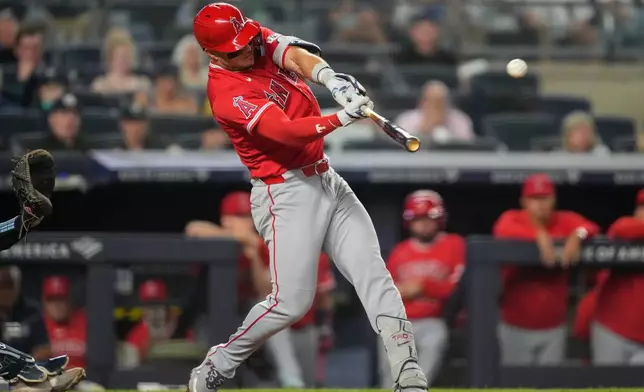 Los Angeles Angels' Mike Trout hits a three-run home run during the sixth inning of a baseball game against the New York Yankees, Monday, April 13, 2026, in New York. (AP Photo/Yuki Iwamura)
