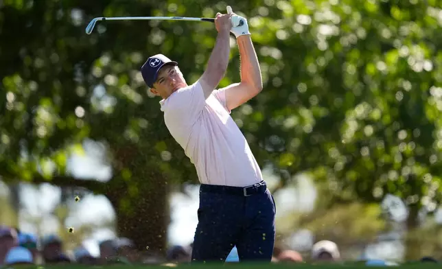 Jordan Spieth watches his tee shot on the fourth hole during the second round of the Masters golf tournament at the Augusta National Golf Club, Friday, April 10, 2026, in Augusta, Ga. (AP Photo/Ashley Landis)