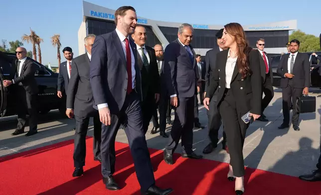 Vice President JD Vance walks with Pakistani Deputy Prime Minister and Foreign Minister Mohammad Ishaq Dar, partially seen on the left, Pakistan's Chief of Defence Forces and Chief of Army Staff Field Marshall Asim Munir, third left, Pakistan's Interior Minister Mohsin Naqvi, and Charge d'Affaires of the U.S. Embassy in Islamabad Natalie A. Baker, right, before boarding Air Force Two after attending talks on Iran in Islamabad, Pakistan, Sunday, April 12, 2026. (AP Photo/Jacquelyn Martin, Pool)