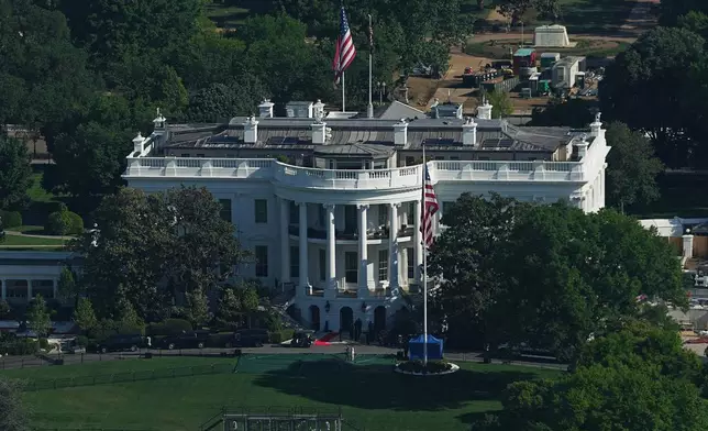 The White House is seen from the Washington Monument, Monday, April 27, 2026, in Washington. King Charles III and Queen Camilla arrive in the U.S. today for a four-day state visit aimed at celebrating the United States' 250th anniversary, including a White House state dinner and a speech to Congress. (AP Photo/Matt Rourke)