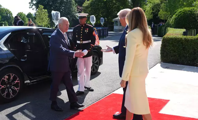 President Donald Trump and first lady Melania Trump greet Britain's King Charles III and Queen Camilla as they arrive at the White House, Monday, April 27, 2026, in Washington (AP Photo/Mark Schiefelbein)