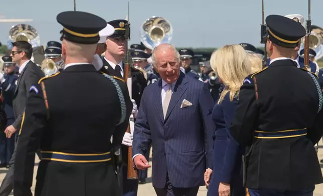 King Charles III speaks with U.S. Chief of Protocol Monica Crowley as he arrives at Joint Base Andrews, Md., Monday, April 27, 2026. (AP Photo/Rod Lamkey, Jr.)