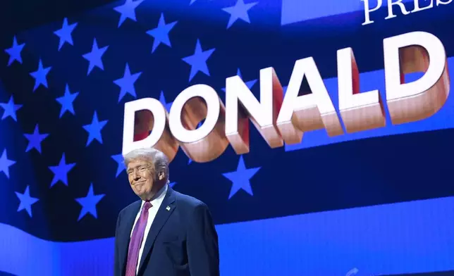 President Donald Trump arrives at a Turning Point USA event at Dream City Church, Friday, April 17, 2026, in Phoenix. (AP Photo/Alex Brandon)