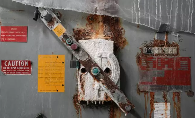 Water damage in the concert hall electric room is seen at the John F. Kennedy Center for the Performing Arts during a media tour, Wednesday, April 22, 2026, in Washington. (AP Photo/Julia Demaree Nikhinson)