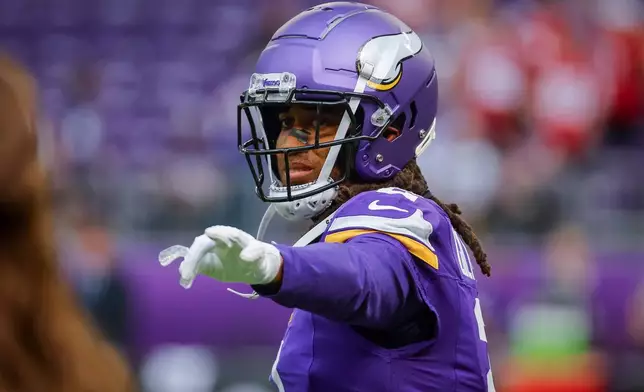 FILE - Minnesota Vikings cornerback Stephon Gilmore warms up before an NFL football game against the San Francisco 49ers, Sept. 15, 2024, in Minneapolis. (AP Photo/Bruce Kluckhohn, File)