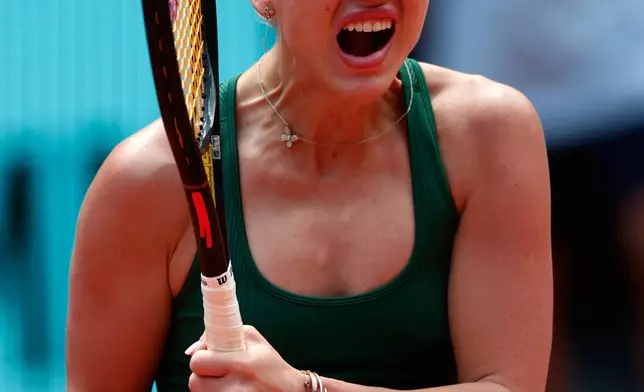 Anastasia Potapova of Russia reacts during her match against Karolina Pliskova of the Czech Republic during the Madrid Open tennis tournament in Madrid, Wednesday, April 29, 2026. (AP Photo/Pablo Garcia)