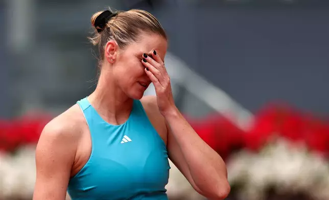 Karolina Pliskova of the Czech Republic reacts during her match against Anastasia Potapova of Russia during the Madrid Open tennis tournament in Madrid, Wednesday, April 29, 2026. (AP Photo/Pablo Garcia)