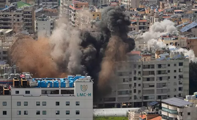 Smoke rises following several Israeli airstrikes in Beirut, Lebanon, Wednesday, April 8, 2026. (AP Photo/Hassan Ammar)