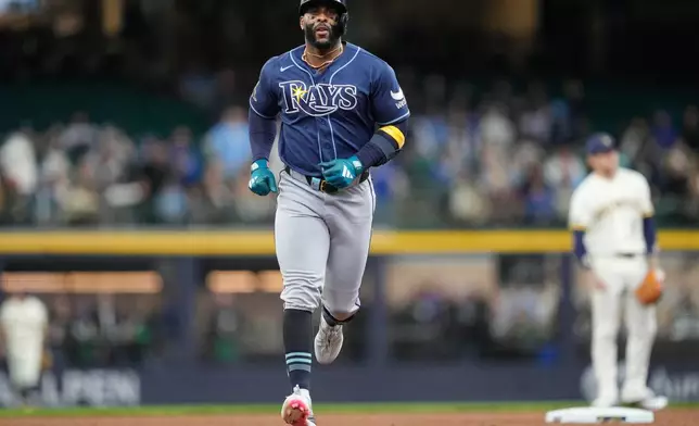 Tampa Bay Rays' Yandy Díaz runs the bases after hitting a two-run home run during the third inning of a baseball game against the Milwaukee Brewers, Wednesday, April 1, 2026, in Milwaukee. (AP Photo/Kayla Wolf)