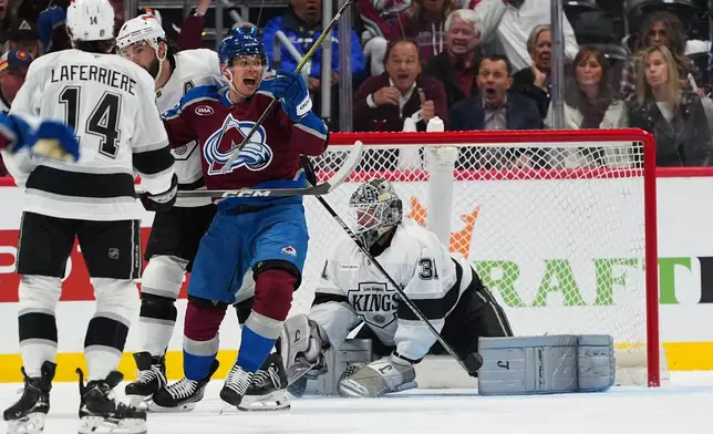 Colorado Avalanche left wing Artturi Lehkonen (62) celebrates after a goal against Los Angeles Kings goaltender Anton Forsberg (31) during the second period of Game 1 in the first round of the NHL hockey Stanley Cup playoffs, Sunday, April 19, 2026, in Denver. (AP Photo Jack Dempsey)