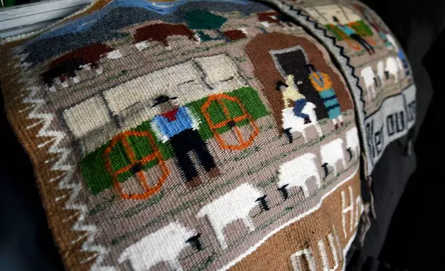 Weavings created by Ella Mae Begay, who went missing from her home, are displayed in her son's home in Denver, April 2, 2026. (AP Photo/Thomas Peipert)