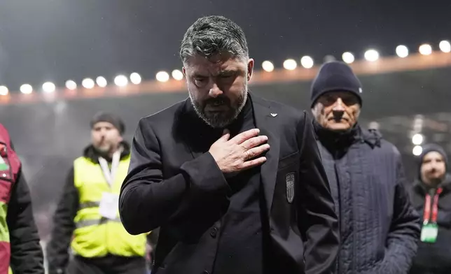 Italy's coach Gennaro Gattuso walks off the pitch after losing in a World Cup qualifying playoff final soccer match between Bosnia and Italy in Zenica, Bosnia, Tuesday, March 31, 2026. (Fabio Ferrari/LaPresse via AP)