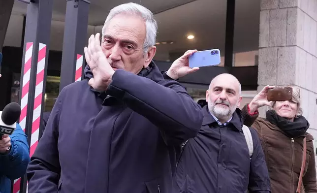 Italy's soccer federation president Gabriele Gravina leaves the FIGC (italian soccer federation) headquarters in Rome, Thursday April 2, 2026 after resigning amid political pressure after the national team failed to qualify for a third consecutive World Cup. (Alfredo Falcone/LaPresse via AP)
