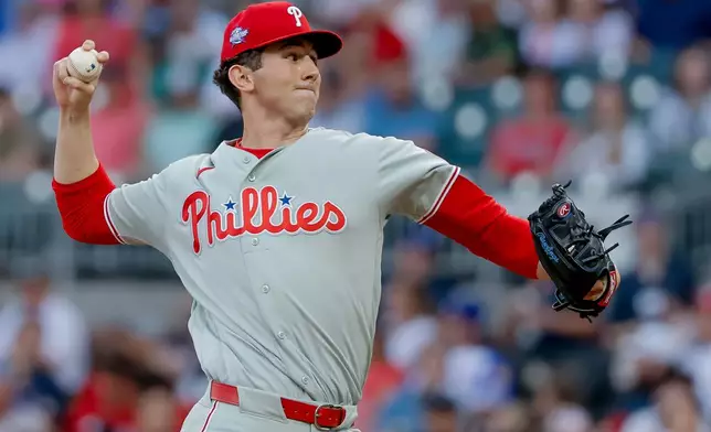 Philadelphia Phillies starting pitcher Andrew Painter delivers to an Atlanta Braves batter during the first inning of a baseball game, Friday, April 24, 2026, in Atlanta. (AP Photo/Erik S. Lesser)