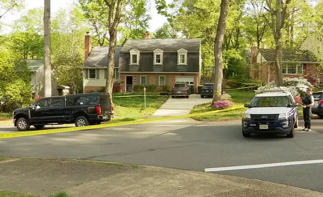Police investigte the scene of an apparent domestic-related shooting early Thursday, April 16, 2026in Annandale, Va. (WJLA via AP)