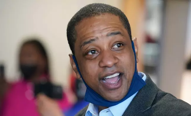 FILE - Virginia Democratic gubernatorial candidate, Lt. Gov. Justin Fairfax, speaks to supporters at Pink Fish restaurant in Hampton, Va., Thursday, April 8, 2021. (AP Photo/Steve Helber, File)