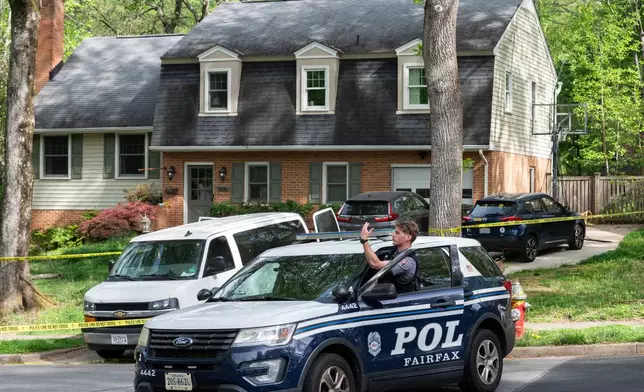 Fairfax County police secure the home of former Virginia Lt. Gov. Justin Fairfax, in Annandale, Va., Thursday, April 16, 2026. (AP Photo/Cliff Owen)