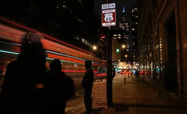 A sign marking the beginning of historic Route 66 stands at the intersection of East Adams Street and South Michigan Avenue, in Chicago, Wednesday, Jan. 14, 2026. (AP Photo/Erin Hooley)
