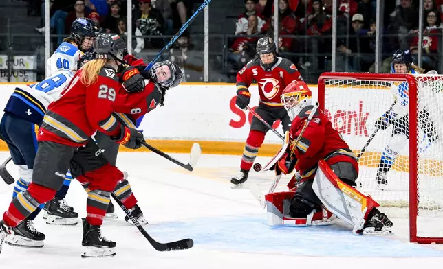 Ottawa Charge's goaltender Gwyneth Philips (33) blocks a shot on net against the Toronto Sceptres during the second period of a PWHL hockey game in Ottawa, Ontario, Saturday, April 25, 2026. (Spencer Colby/The Canadian Press via AP)