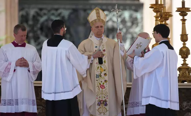 Pope Leo XIV presides over Easter Mass in St. Peter's Square at the Vatican, Sunday, April 5, 2026 (AP Photo/Andrew Medichini)