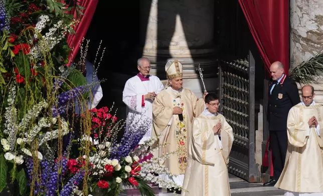 Pope Leo XIV arrives to preside over Easter Mass in St. Peter's Square at the Vatican, Sunday, April 5, 2026 (AP Photo/Alessandra Tarantino)