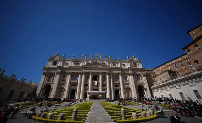 Pope Leo XIV delivers the Urbi et Orbi blessing - Latin for "to the city of Rome and to the world" - from the central loggia of St. Peter's Basilica at the end of Easter Mass he presided over in St. Peter's Square at the Vatican, Sunday, April 5, 2026. (AP Photo/Andrew Medichini)
