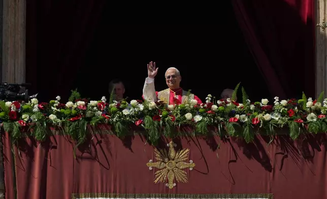 Pope Leo XIV addresses the faithful after delivering the Urbi et Orbi blessing - Latin for "to the city of Rome and to the world" - from the central loggia of St. Peter's Basilica at the end of Easter Mass he presided over in St. Peter's Square at the Vatican, Sunday, April 5, 2026. (AP Photo/Andrew Medichini)