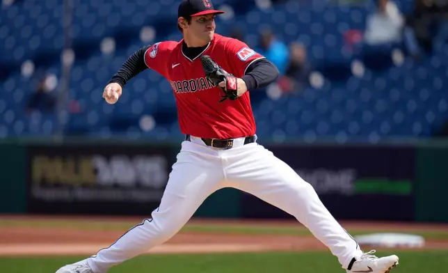 Cleveland Guardians' Gavin Williams pitches in the first inning of a baseball game against the Kansas City Royals in Cleveland, Tuesday, April 7, 2026. (AP Photo/Sue Ogrocki)